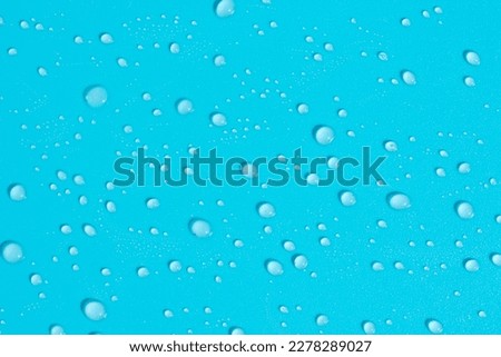 Pattern made of lots of little water dew drops shining and glowing on bright sunlight as mock up with copy space, macro Royalty-Free Stock Photo #2278289027