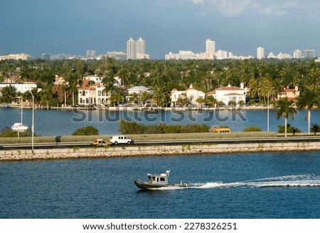 The view of a motorboat traveling along Miami Main Channel (Florida).