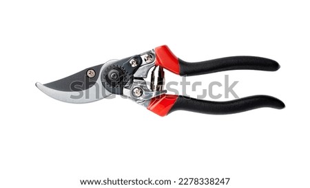 Secateurs. The hand tool is designed to remove shoots and small branches when forming the crown of small trees and shrubs. Isolated on white background. Closed state. Top view. Royalty-Free Stock Photo #2278338247