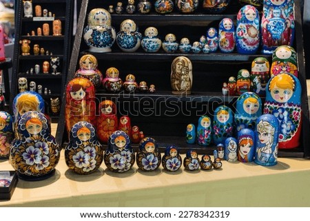 Matryoshka dolls for sale in a booth at an event celebrating Greek culture Royalty-Free Stock Photo #2278342319