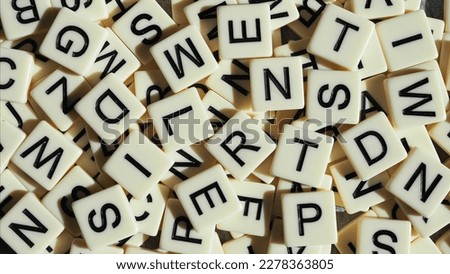 mixed up capital letters as background 