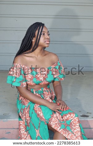 Photo of a Beautiful Black Lady in a park