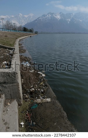 Environmental Hazard: Pollution on the Sideways of a Water Body. Water body in the lap of Himalayas.