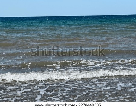 A breathtaking blue ocean picture - tranquil and mesmerizing, evoking a sense of peace and serenity.