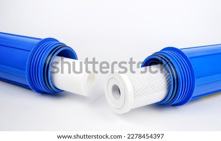Osmosis filter, new pure filter. Clean water at home. Health care water filtration system concept. Cleaning inspection of household water filtration.	               Royalty-Free Stock Photo #2278454397