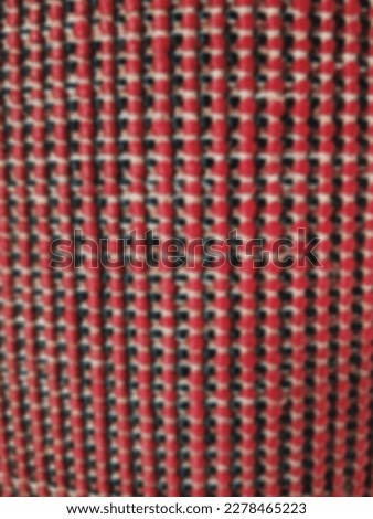 Red carpet texture photo out of focus