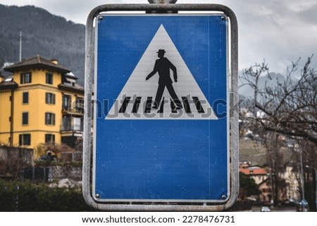 a sign or crosswalk on the highway.