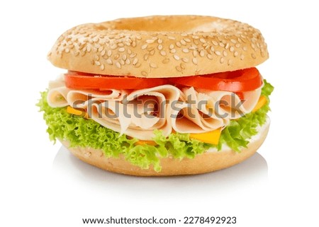 Bagel sandwich with fresh chicken ham for breakfast isolated on a white background Royalty-Free Stock Photo #2278492923