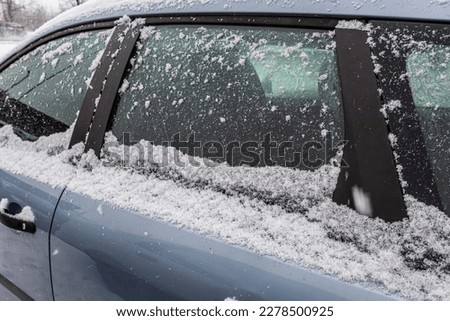 Cars Covered With A Snow In A Row After Snowfall Detailed Stock Photo.