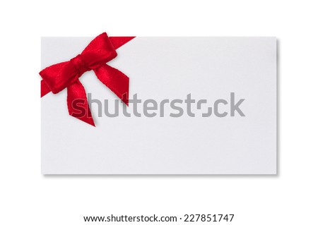 White paper card with a red bow on a white background.
