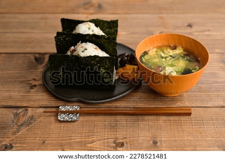 rice ball with grilled mackerel mixed with rice and miso soup