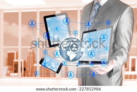 Business man using tablet PC and smartphone social connection