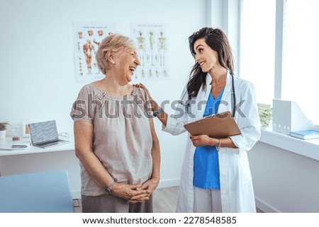 Internist and patient during medical consultation in the doctor's office. Doctor working in the office and listening to the patient, she is explaining her symptoms, healtcare and assistance concept Royalty-Free Stock Photo #2278548585