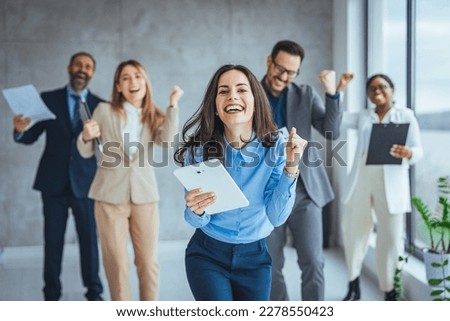 Team Huddle Harmony Togetherness Happiness Concept. Group of joyful excited business people throwing papers and having fun in office. Group of team creative business people Happy to be successful  Royalty-Free Stock Photo #2278550423