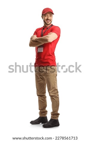 Full length shot of a young male sales worker wearing a red t-shirt isolated on white background Royalty-Free Stock Photo #2278561713
