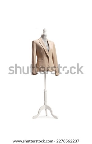 Mannequin doll with a beige suit isolated on white background Royalty-Free Stock Photo #2278562237