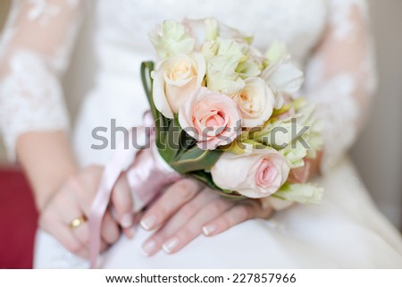 wedding pictures with details of flowers, dress lace details, hands and wedding rings