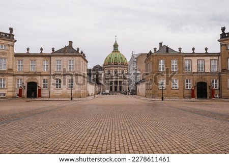 The view of Frederick’s Church and Amalienborg Palace, the residence of the Danish royal family, in the center of Copenhagen, Denmark