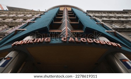 the facade of the 24-hour parking building