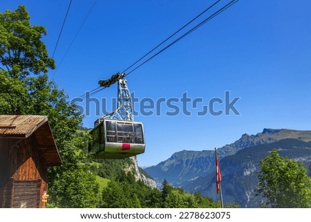 View of the big gondola in the Swiss Alps in the summer