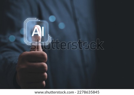 Businessman touching AI button working of Artificial Intelligence (AI) Automation, Predictive analytics, Customer service AI-powered chatbot, analyze customer data, business and technology. Royalty-Free Stock Photo #2278635845