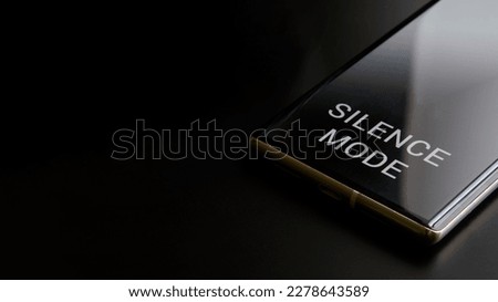 Fragment of the screen of a mobile phone - smart phone with silence mode enabled. Barring incoming calls and messages. Copy space. Black background. Selective focus. Close-up Royalty-Free Stock Photo #2278643589
