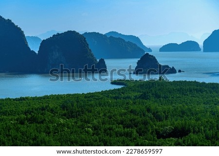 Panoramic wonderful landscape of nature and twilight sunrise sky at Samet Nangshe viewpoint, Phang Nga, Hilltop viewpoint, a cafe overlooking, Andaman sea paradise landscape and wonderful viewpoint Royalty-Free Stock Photo #2278659597