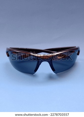 object sunglasses on a blue background