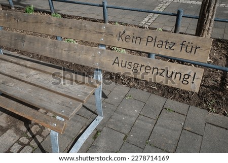 Bench with inscription Kein Platz für Ausgrenzung translation No place for exclusion