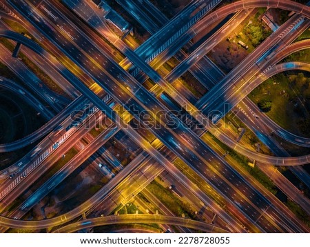 High angle view of evening traffic on complex roads and bridges, heavy traffic during rush hour. Royalty-Free Stock Photo #2278728055