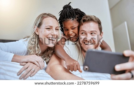 Family, selfie and happiness on bed for social media profile picture or post about adoption, love and support of parents for foster child. Man, woman and girl together in bedroom with smartphone