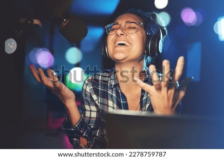 Radio DJ, headphone and microphone, woman is excited with singing or talking, broadcast media and announcement. Female in studio booth, recording and happiness with smile, excitement and carefree
