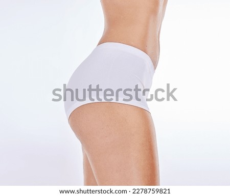 Buttocks, underwear and body with a model woman in studio on a gray background to promote weightloss or diet. Fitness, skin and panties with a female posing for wellness, losing weight or lifestyle