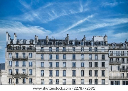 Paris, ancient buildings, typical parisian facades with a lamppost