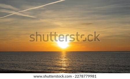 image of a golden sunrise on a beach in andalusia