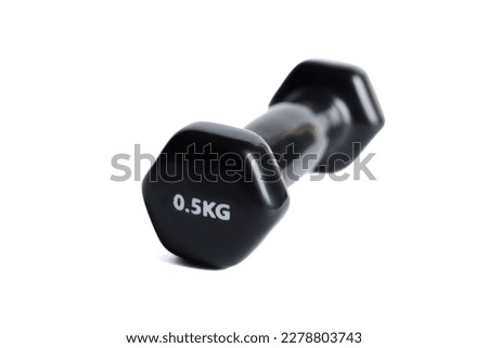 A black vinyl dumbbell isolated on a white background. 
The weight of one dumbbell is 0,5 kg. Royalty-Free Stock Photo #2278803743