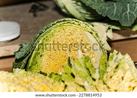 savoy cabbage in closeup in the kitchen Royalty-Free Stock Photo #2278814953