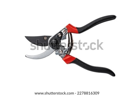 Secateurs. The hand tool is designed to remove shoots and small branches when forming the crown of small trees and shrubs. Isolated on white background. Open state. Top view. Royalty-Free Stock Photo #2278816309