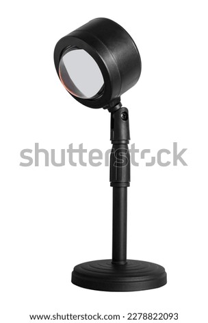 Lamp illuminator on a tripod on a white background in insulation