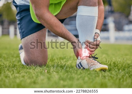 Sports, foot pain and man with injury on field after practice match, training and game outdoors. Medical emergency, accident and rugby athlete with joint inflammation, x ray sprain and tendinitis Royalty-Free Stock Photo #2278826555