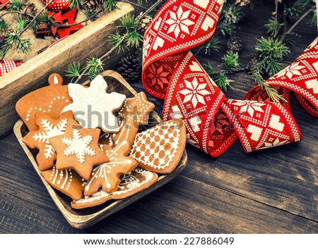 christmas ornaments and gingerbread cookies. vintage style toned picture