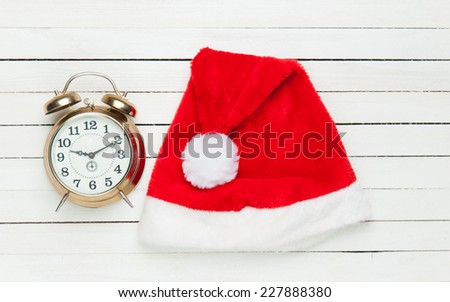 Alarm clock and santas hat