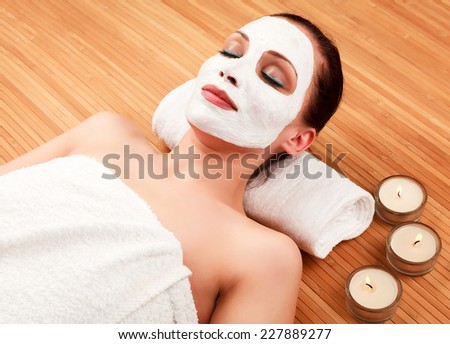 Woman with a cream on her face 