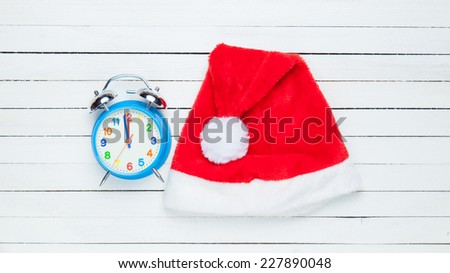 Alarm clock and Santas hat.
