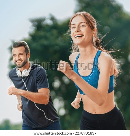Morning jogging. Happy excited young couple, runners running together, woman train with man, or bearded fit coach exercising outdoors. Fitness, sport city marathon workout concept. Square image Royalty-Free Stock Photo #2278901837