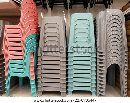 Beautiful plastic chairs are sold in supermarkets