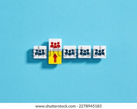 The most successful team among the others. Best teamwork performance. Building a successful leading team and effective teamwork. Team and arrow symbols on white blocks.