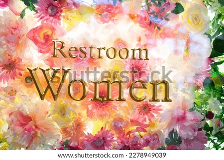 women toilet sign background decorated with colorful flowers.