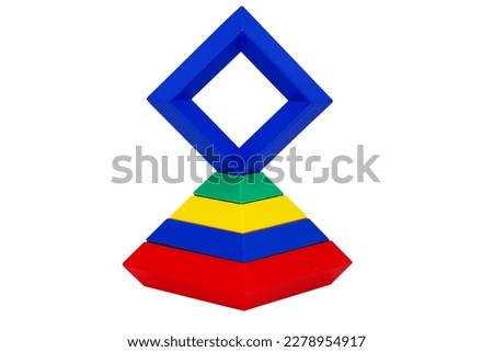 Plastic childres toy isolated on a white background.  Logo for the organization. Smart toys.                       