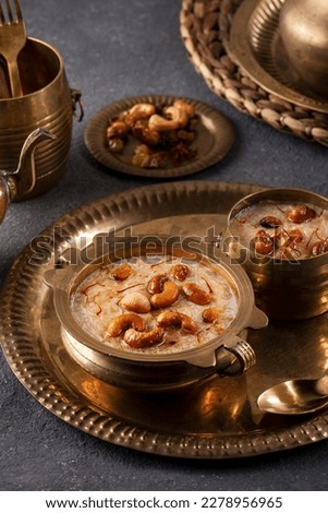 Famous Indian dessert sheer kurma or semiya payasam servrd in traditional brass bowl Royalty-Free Stock Photo #2278956965